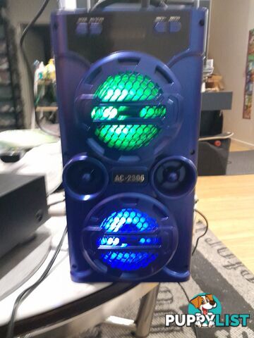 AC-2306 PORTABLE WIRELESS LOUD SPEAKER DOCK BLUE TOOTH PHONE DEVICES DISCO LED KARAOKE