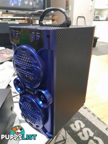 AC-2306 PORTABLE WIRELESS LOUD SPEAKER DOCK BLUE TOOTH PHONE DEVICES DISCO LED KARAOKE