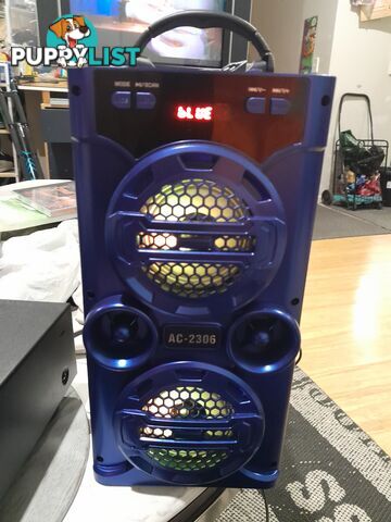AC-2306 PORTABLE WIRELESS LOUD SPEAKER DOCK BLUE TOOTH PHONE DEVICES DISCO LED KARAOKE