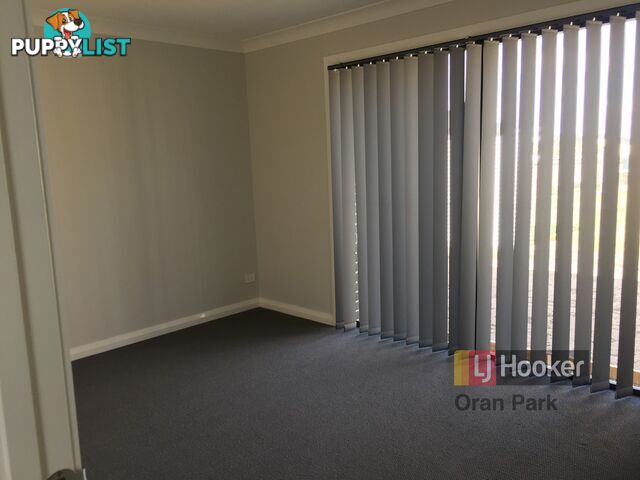 4a Courtney Loop ORAN PARK NSW 2570