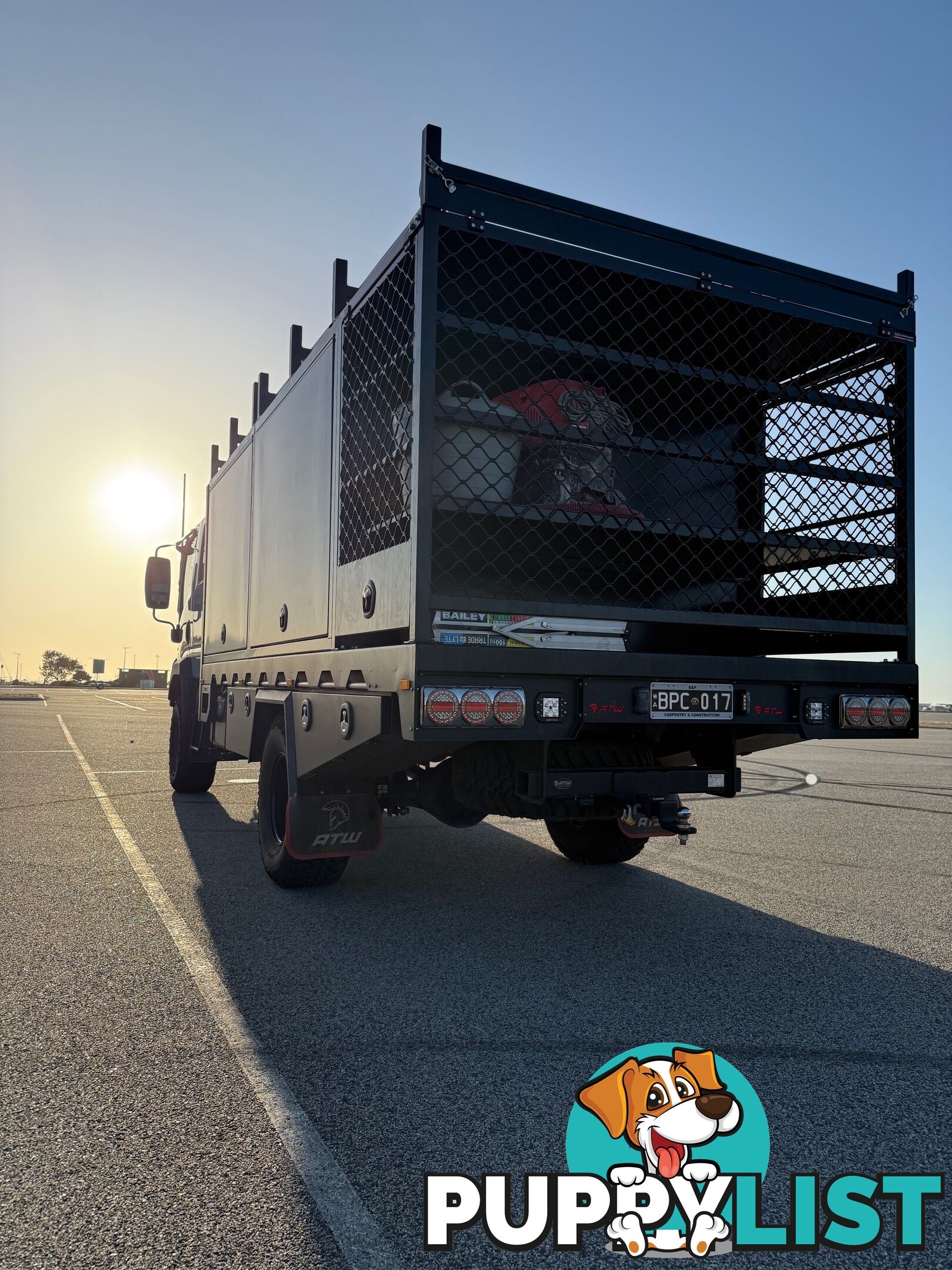 2023 Isuzu NPS75-155 Crew Cab AL Grey, 5.2L T/D AMT Chassis extended