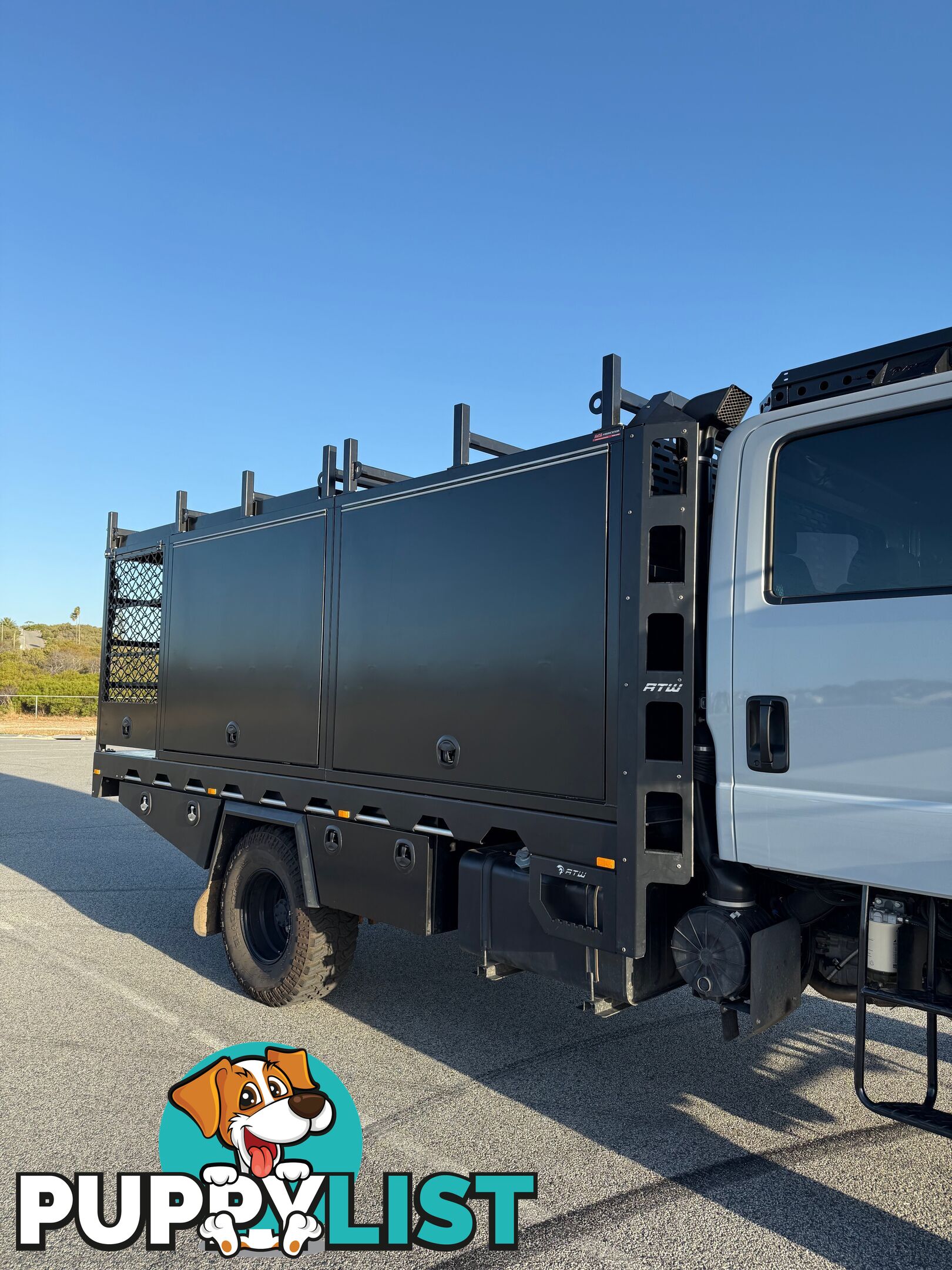 2023 Isuzu NPS75-155 Crew Cab AL Grey, 5.2L T/D AMT Chassis extended