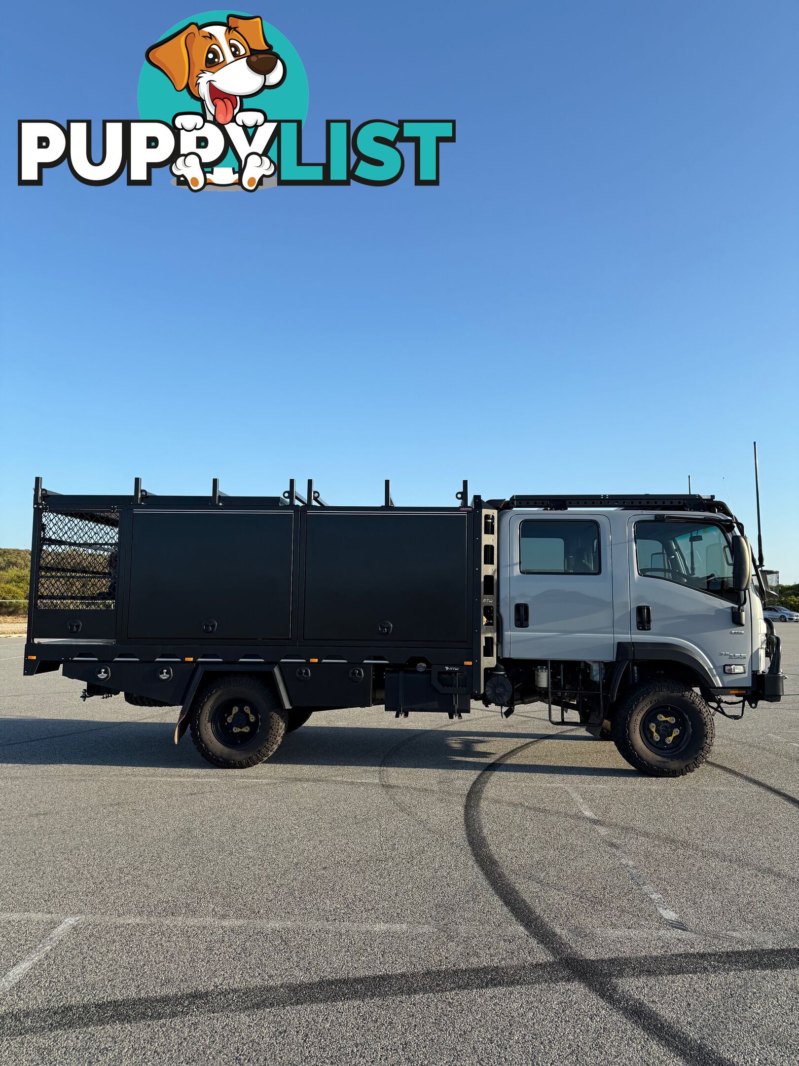 2023 Isuzu NPS75-155 Crew Cab AL Grey, 5.2L T/D AMT Chassis extended