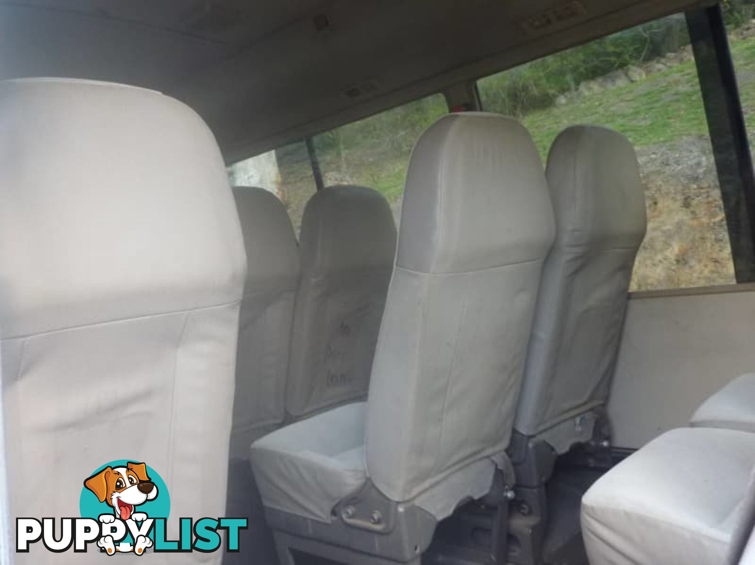 2004 Mitsubishi Rosa Bus White