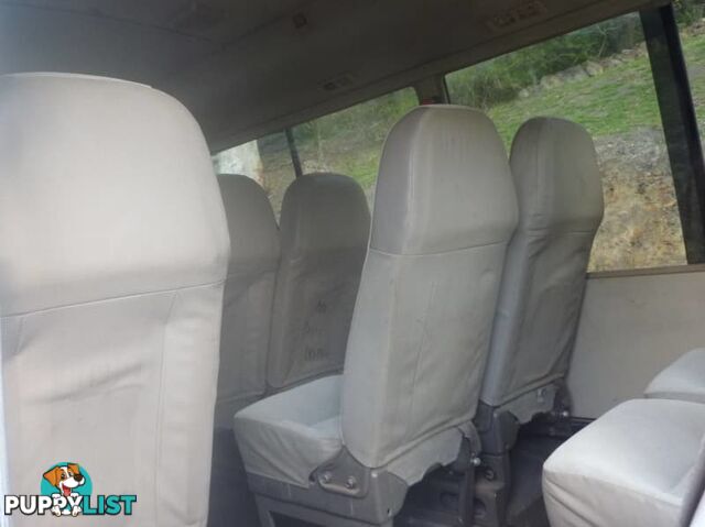 2004 Mitsubishi Rosa Bus White