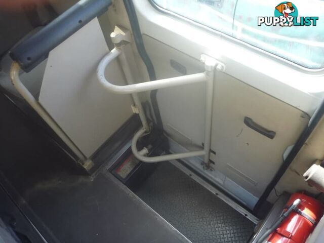 2004 Mitsubishi Rosa Bus White