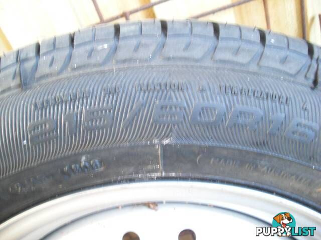 NEW FORD FALCON RIM 16 INCH AND TYRE 215/60/16 GOOD YEAR TYRE MA