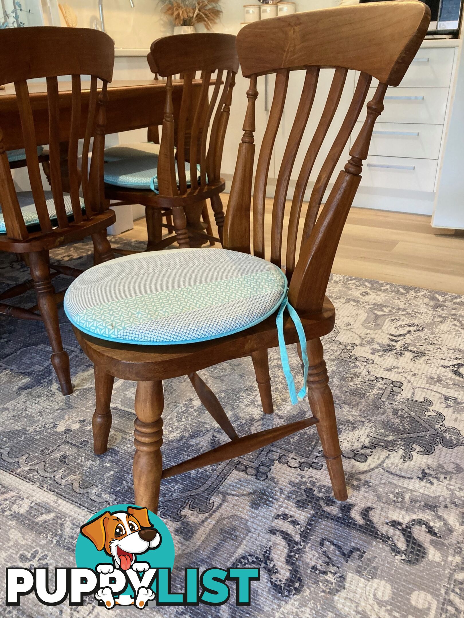 TEAK DINING TABLE and 8 matching chairs