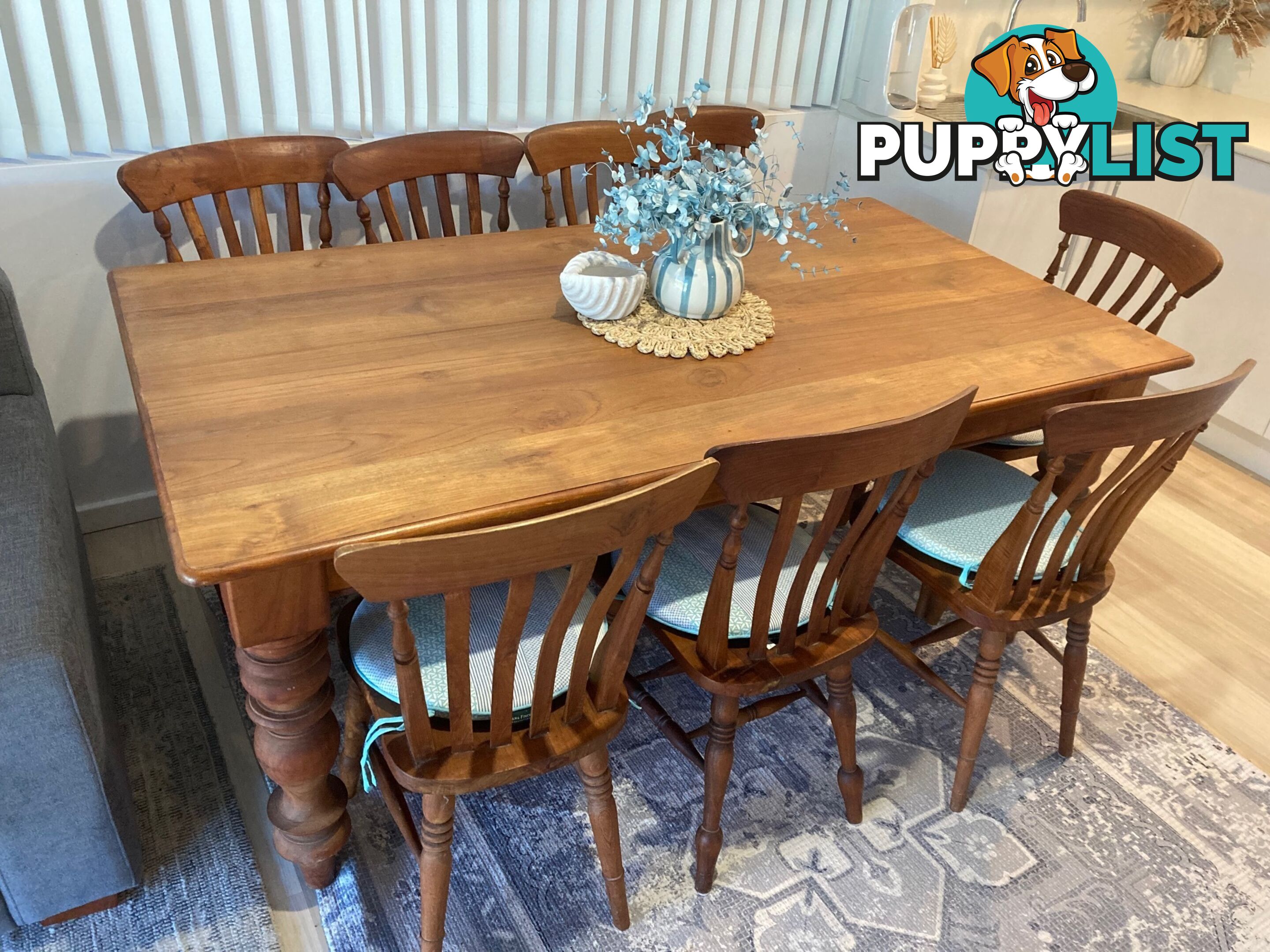 TEAK DINING TABLE and 8 matching chairs