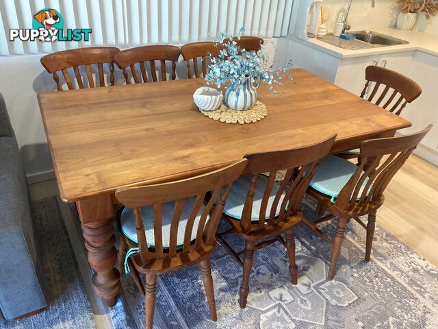 TEAK DINING TABLE and 8 matching chairs