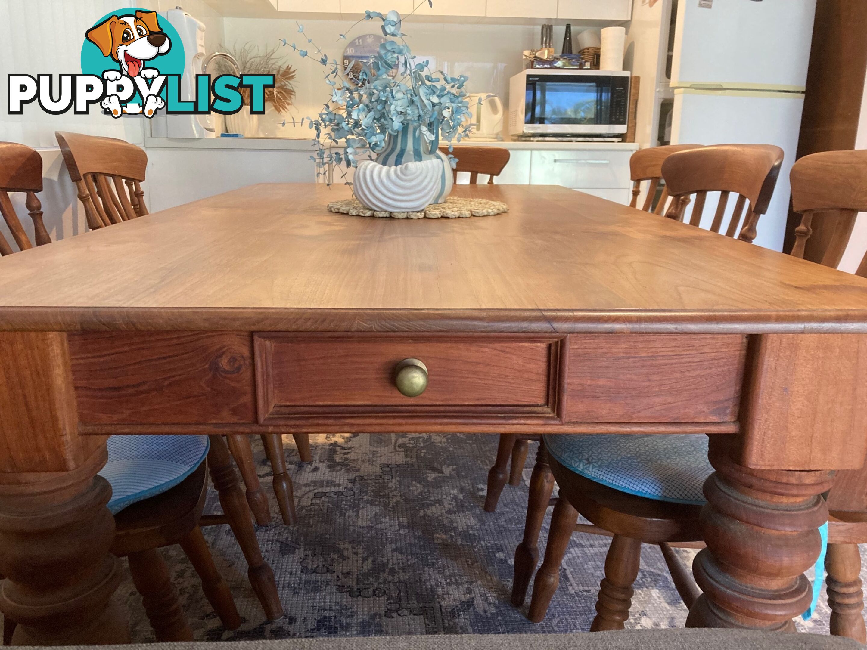 TEAK DINING TABLE and 8 matching chairs