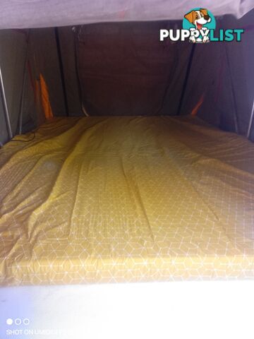 Howling Moon roof top camper