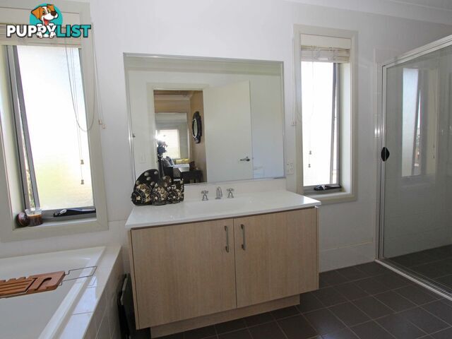 26 Northampton Drive GLENFIELD NSW 2167