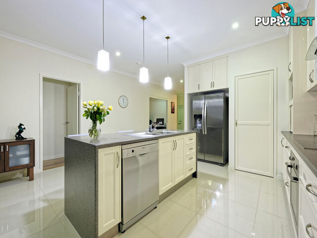 8 Golden Penda Court KALKIE QLD 4670