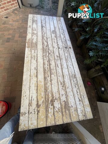 Unique rectangular table refashioned from an old Timber door