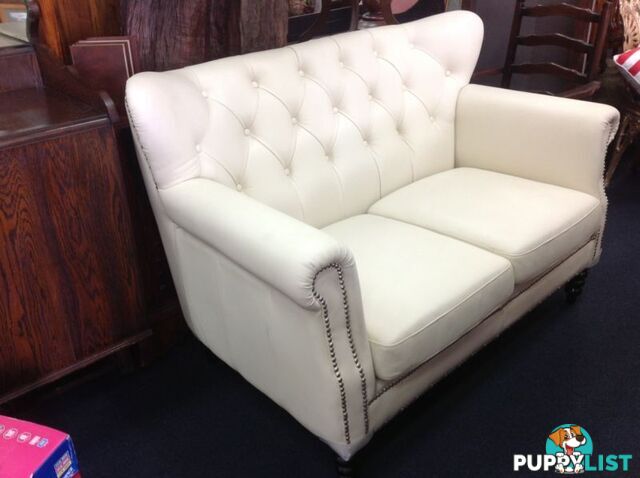 BRAND NEW Bone coloured high grade leather 2 seater sofa