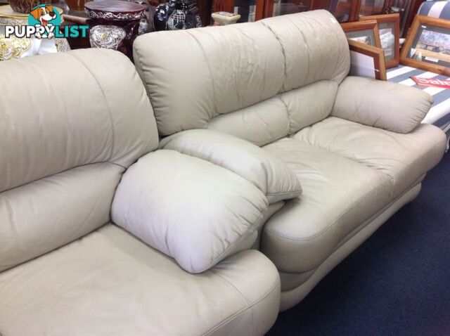 Cream leather 2 seater sofas - 2 available