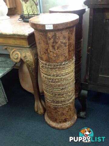 Marble look pillar with rope accents. Plant stand or ornament