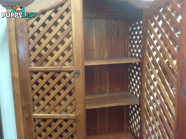 Teak lattice storage cabinet. Books, videos, drinks cabinet