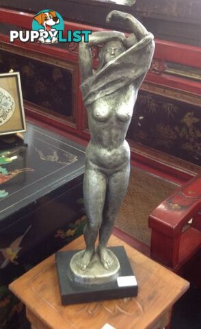 Sculpture of a nude lady by Austin Prod Inc