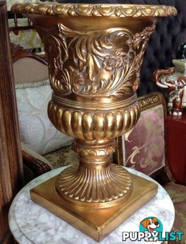 Gold ornate exquisite urn