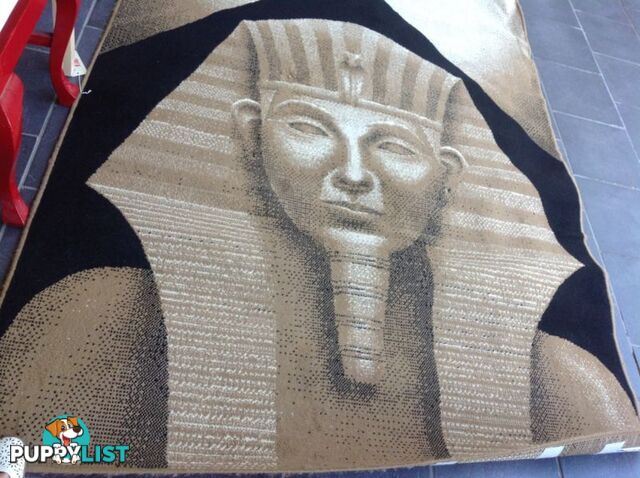 Egyptian face on rug 159cm wide x 220cm long