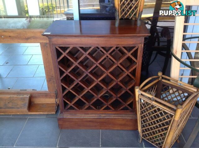 Wine cabinet in timber holds 24 bottles