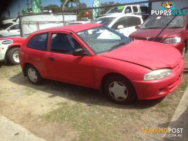 2000 Mitsubishi Lancer  Mirage 3 door  manual 1.5 LEFT TAIL LIGHT A1007