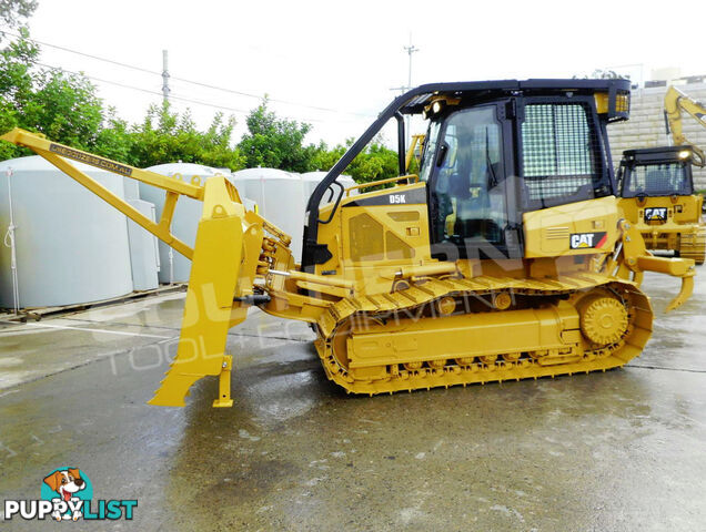 Caterpillar D5K WT Bulldozer with Drive in Stick Rake Tree Spear