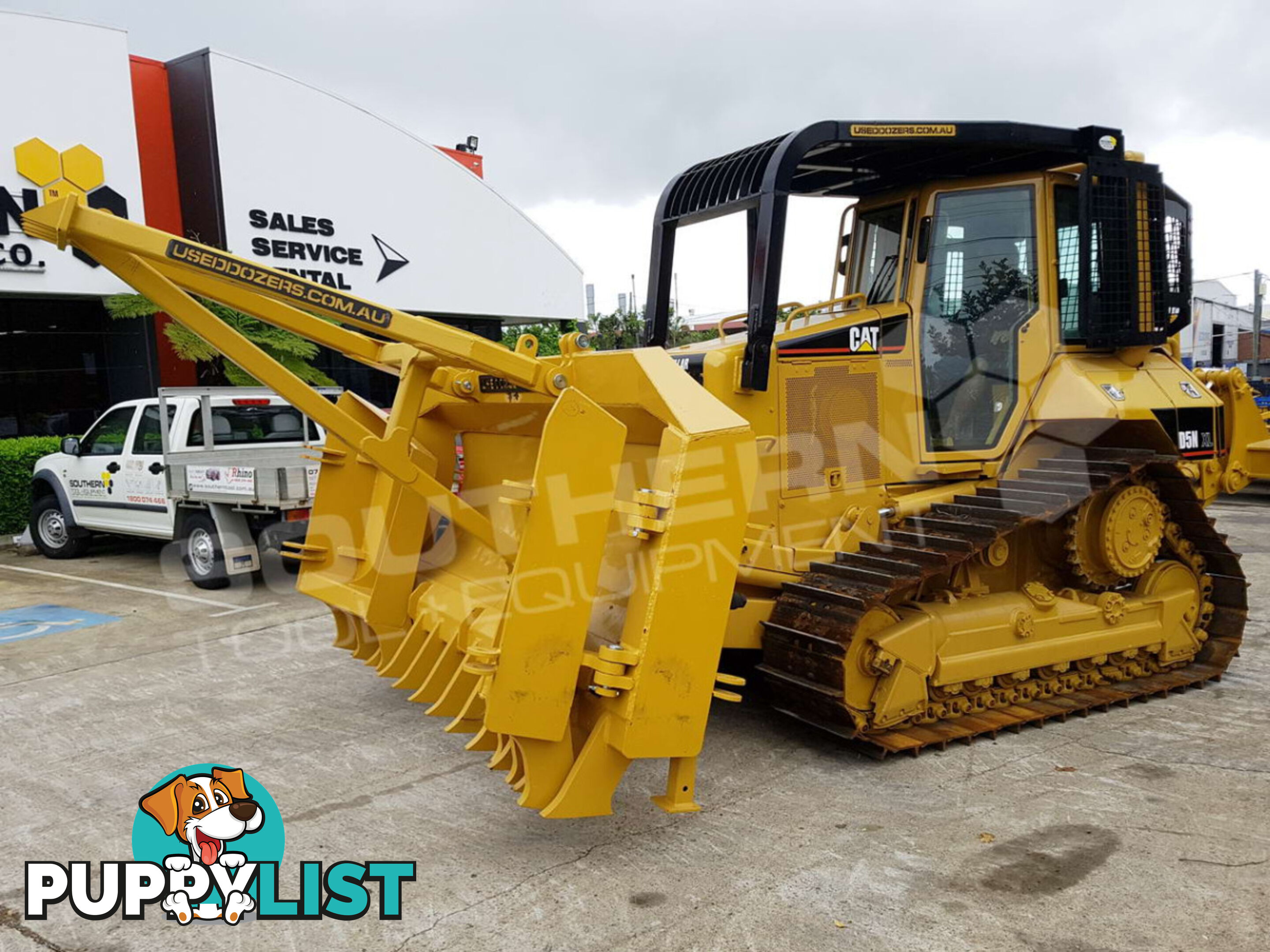 Caterpillar D5N XL Bulldozer with Drive in Stick Rake & Tree Spear 