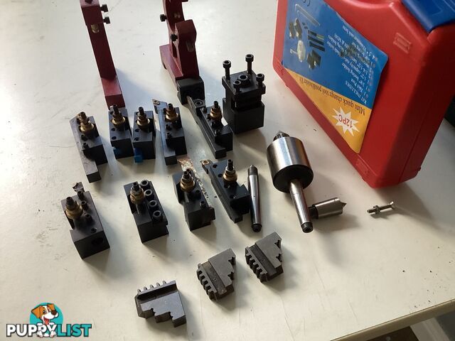 bench lathe with 3 jaw chuck and vertical milling attatchment.