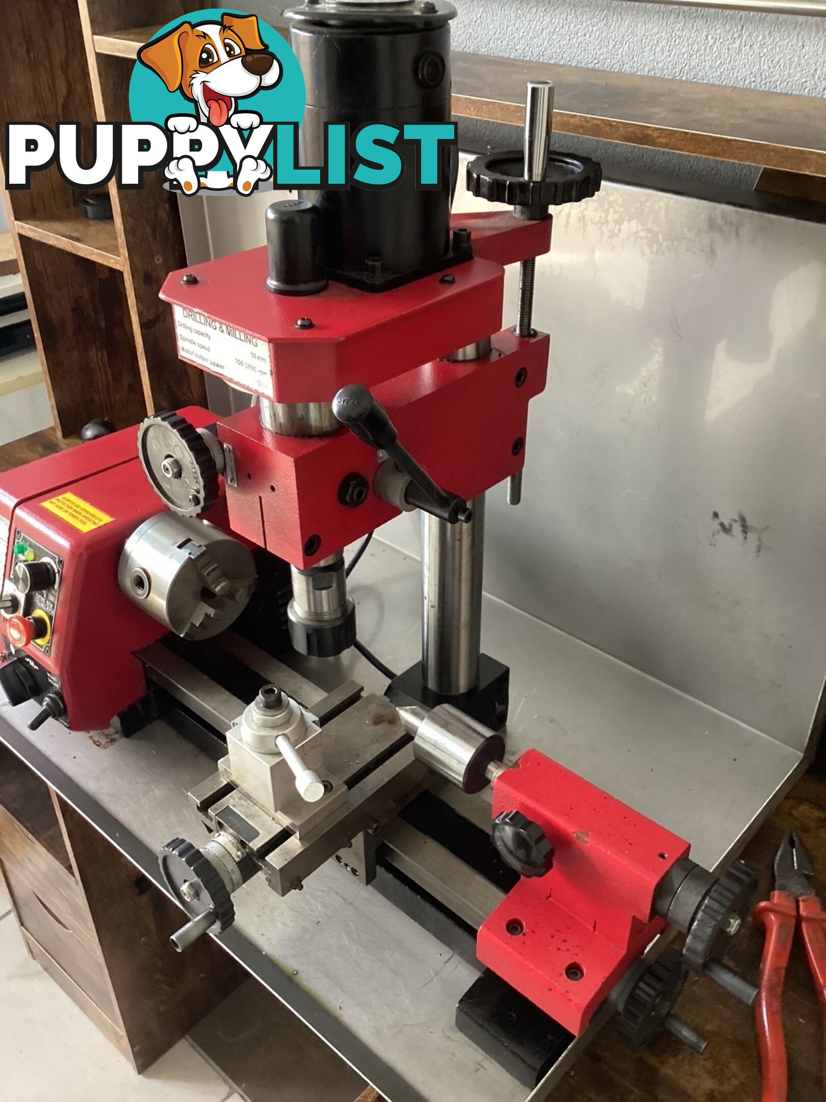 bench lathe with 3 jaw chuck and vertical milling attatchment.